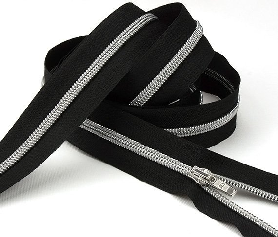 brede rits op de rol metaalkleurig