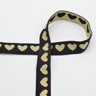 taille-elastiek 2,5 cm breed: glanzende goudkleurige hartjes op zwart / HALVE METER