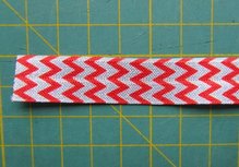 omvouwelastiek rood/grijs chevronmotief