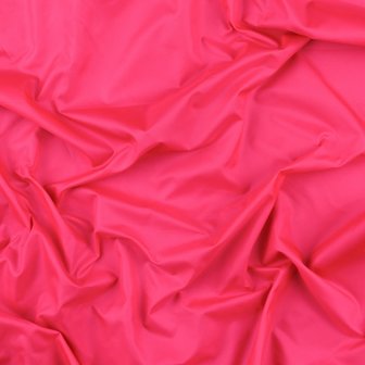 coupon 160 cm: LORO: jassenstof neon-roze winddicht en waterafstotend