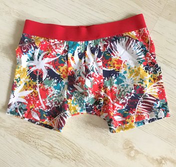 Lara: tricot met ananas en palmbomen op drukke kleuren