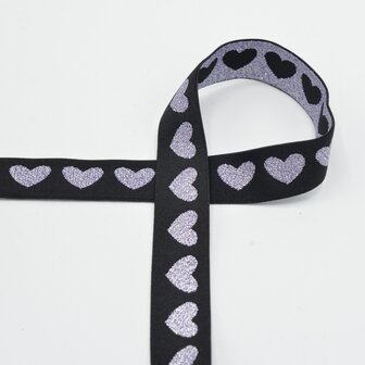 taille-elastiek 2,5 cm breed: glanzende lila hartjes op zwart / HALVE METER