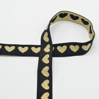 taille-elastiek 2,5 cm breed: glanzende goudkleurige hartjes op zwart / HALVE METER