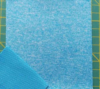 Borax = dunne softshell turquoise gemêleerd: wind-, waterdicht en ademend!